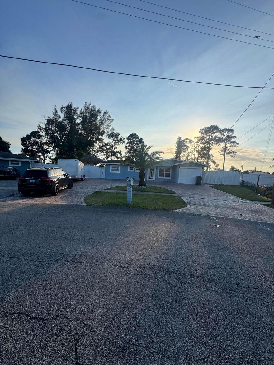 Beautiful 3-bedroom, 3-bathroom waterfront home with a private pool, ideally located in the heart of West Palm Beach--just minutes from I-95, beaches, downtown, shopping, and dining.

This bright, open-concept home features modern finishes, tile flooring throughout, and a stylish kitchen with stunning countertops and stainless steel appliances. Additional highlights include a Florida room, washer and dryer, and a spacious driveway.

The backyard is a true oasis with a heated pool and spa,with heating system , fully equipped outdoor kitchen, covered patio, shed, and a fully fenced yard. Plenty of space to park a boat, RV, or trailer.

A perfect blend of comfort, style, and location--don't miss this opportunity!