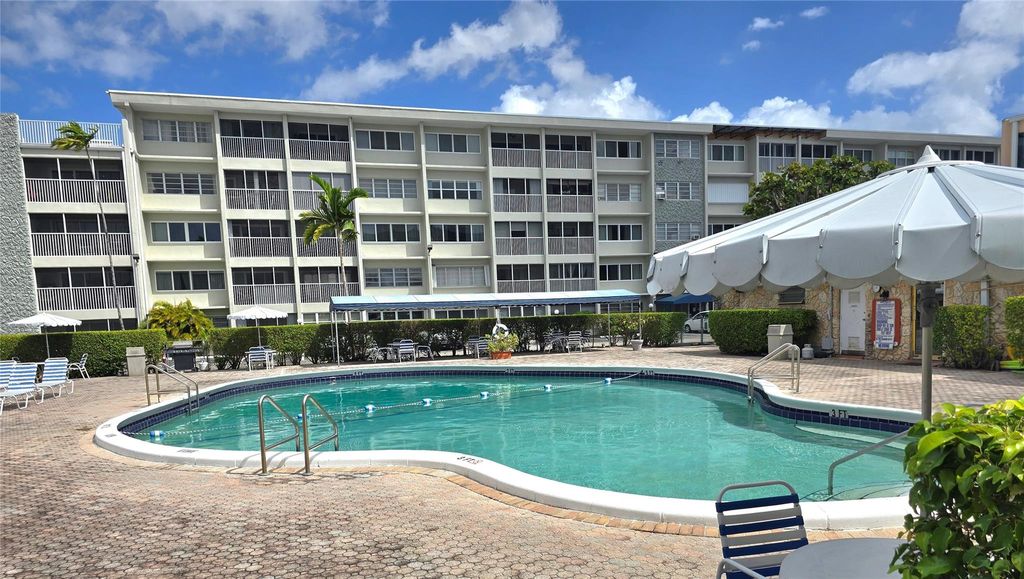 Photo of 410 SE 2nd St #217, Hallandale Beach, FL 33009 (MLS # F10495148)