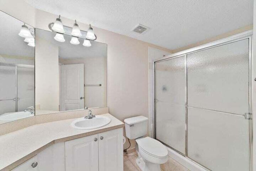 Photo of 11015 Legacy Lane #303, Palm Beach Gardens, FL 33410 (MLS # R11084642)