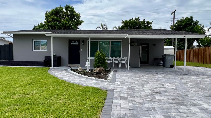 Great opportunity for a first time buyer or Airbnb! 3bed 2bath all remodeled home, east Pompano in the desirable Cresthaven area!! Large and spacious open floorplan, brand new kitchen with shaker wood cabinets, waterfall island, laundry room, impact windows, new A/C, new sprinkler pump and landscaping,  waterproof vinyl floors, new bathrooms, beautiful ceilings with no popcorn and recessed LED lights,  oversized pavers driveway, synthetic grass playing area, plus a carport for extra storage and parking!!