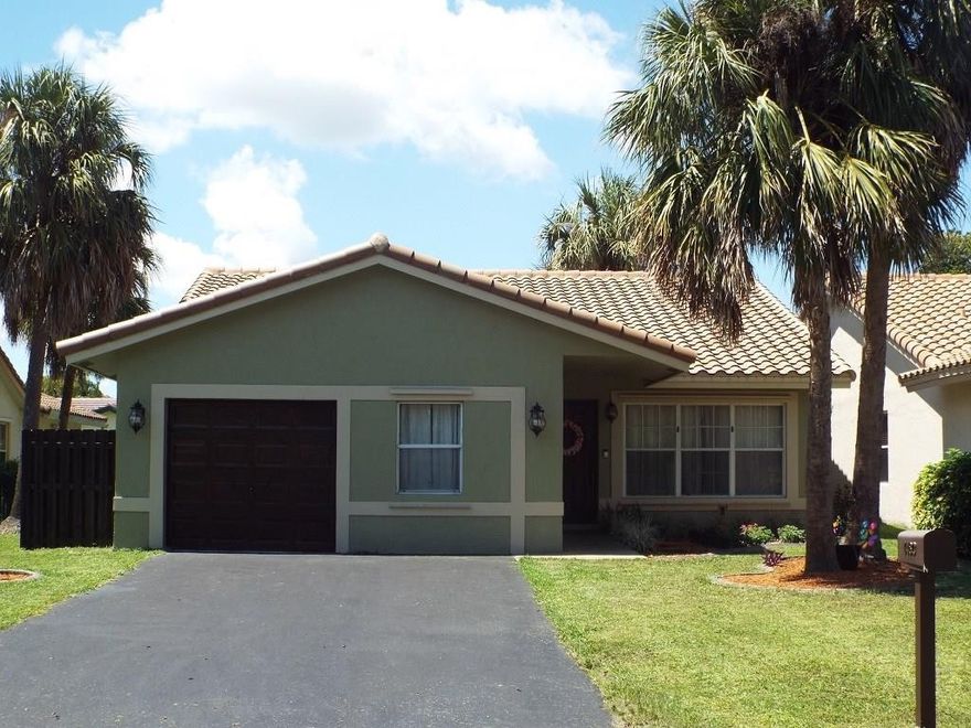 PRICE REDUCTION! CALL TO ACTION, MAKE AN OFFER TODAY! Amazing opportunity to live in the heart of Coral Springs. This 4 bdr 2 bath (could be 5 bedrooms) expanded model boasts an additional den/office with window. Oversized light, bright kitchen has window to enable beautiful natural light, stainless steel appliances and a lovely coffee bar with cabinetry! Master shower is huge! Wonderful family home has enormous yards; front & back, with plenty of room for a pool, swing set, and tree house! Room for 5 cars on driveway! Great schools, close to terrific local shops and restaurants! Conventional financing as well as FHA and VA welcome, pets welcome, all ages welcome! Come see your new home and start making wonderful memories today!