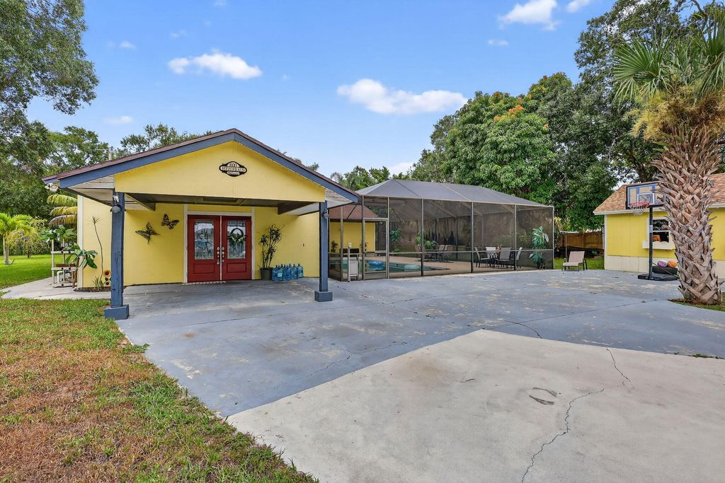 Photo of 600 Gopher Hill Road, Fort Pierce, FL 34982 (MLS # R11148605)