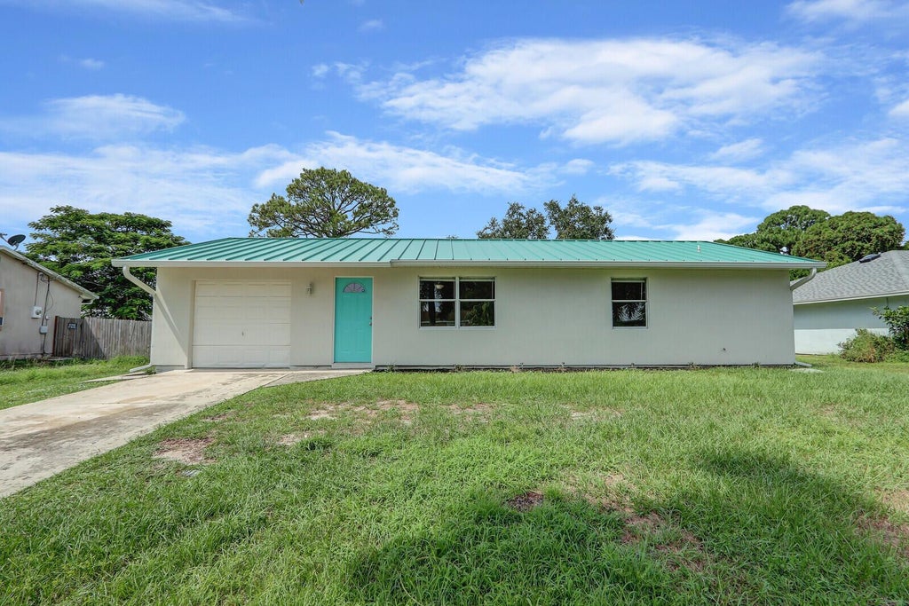 Photo of 1542 SW Curry Street, Port Saint Lucie, FL 34983 (MLS # R11024549)