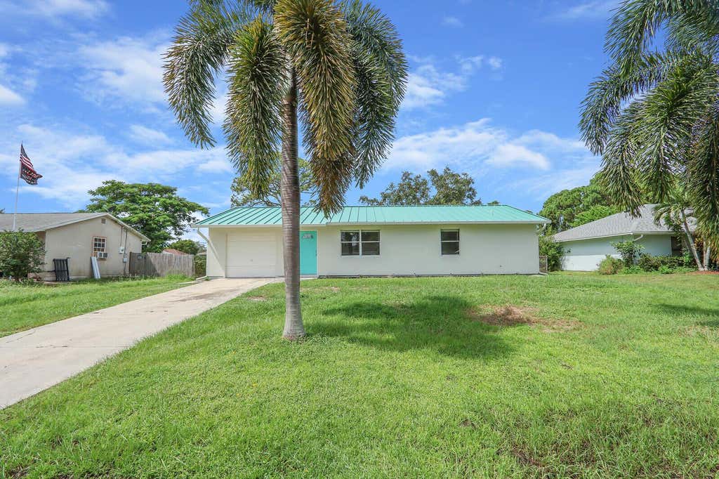 Photo of 1542 SW Curry Street, Port Saint Lucie, FL 34983 (MLS # R11024549)
