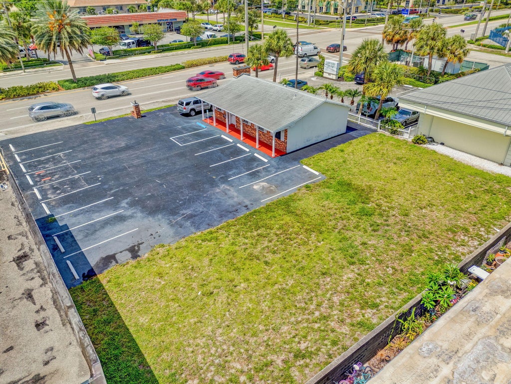 Photo of 610 Northlake Boulevard, Lake Park, FL 33408 (MLS # B26041708)
