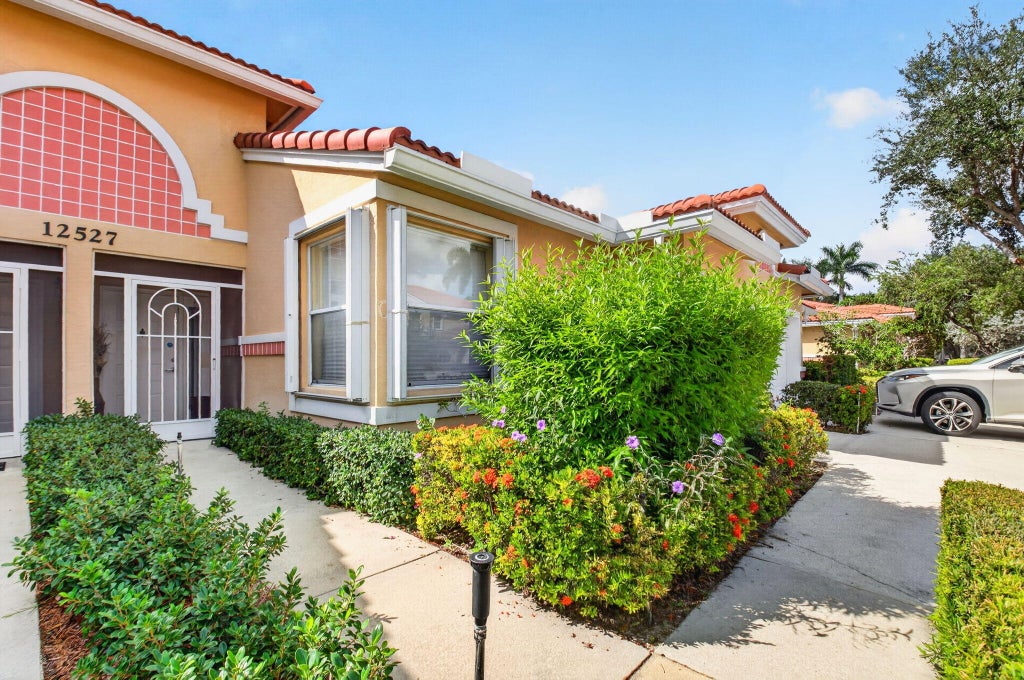 Photo of 12527 Crystal Pointe Drive #C, Boynton Beach, FL 33437 (MLS # B26085279)