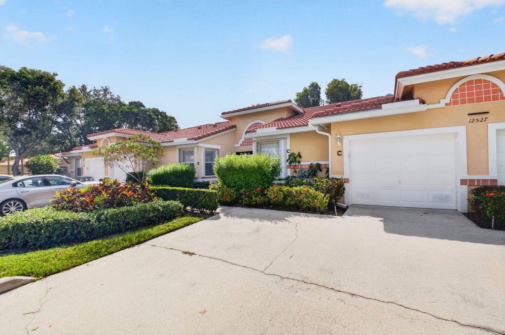 Photo of 12527 Crystal Pointe Drive #C, Boynton Beach, FL 33437 (MLS # B26085279)