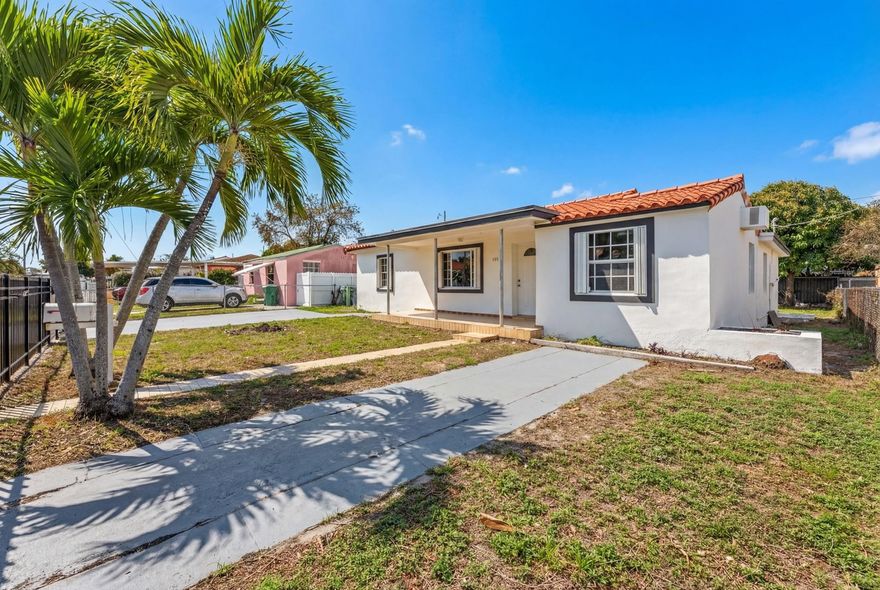 Welcoming 4-bedroom, 2-bath home in the heart of Miami, full of charm and character, featuring beautiful arched hallways throughout. Freshly painted and move-in ready, the home offers separate living, family, and formal dining areas, providing plenty of living space. The kitchen features wood cabinetry. Property includes accordion hurricane shutters for added protection and convenience. Large fenced backyard and an iron exterior gate that provides extra privacy and security. Plenty of parking with room for a work truck, RV, or boat. No HOA. The home also offers great income potential with a separate exterior entrance to a 1/1 that can easily be converted into an in-law quarters. Located in a great neighborhood close to everything Miami has to offer.