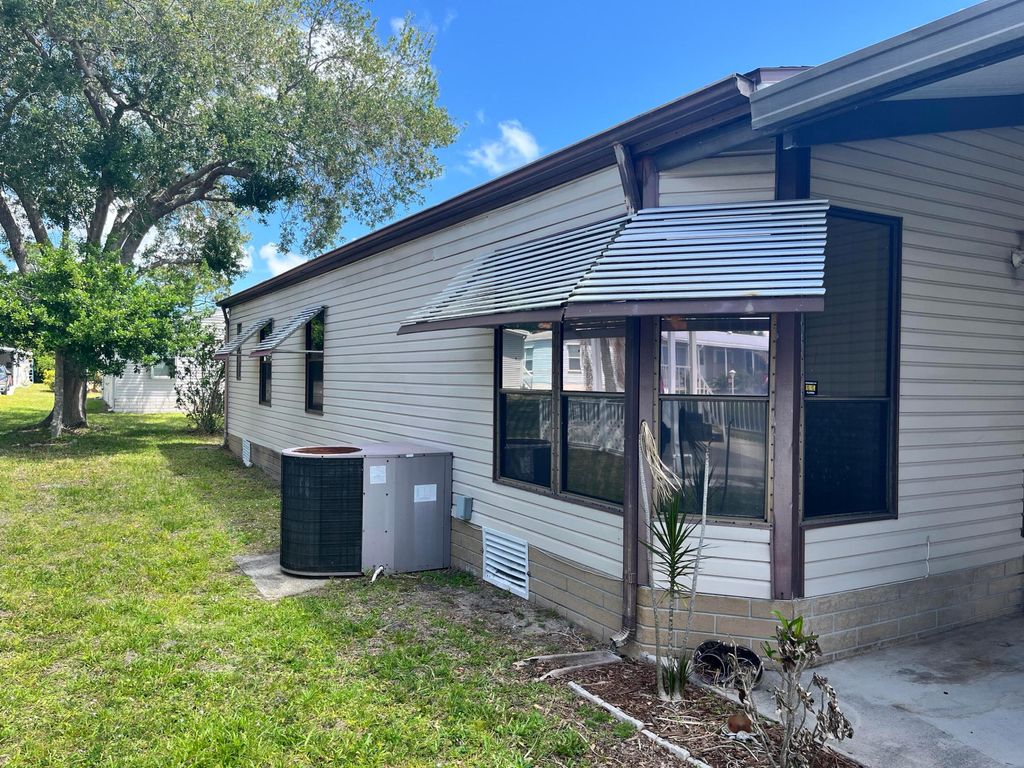 Photo of 240 Mangrove Bay Place, Fort Pierce, FL 34982 (MLS # B26021333)