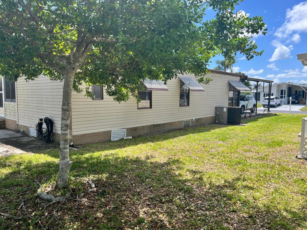 Photo of 240 Mangrove Bay Place, Fort Pierce, FL 34982 (MLS # B26021333)