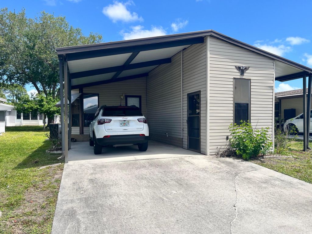 Photo of 240 Mangrove Bay Place, Fort Pierce, FL 34982 (MLS # B26021333)