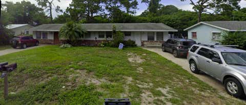 Photo of 902 N Lake Drive, Fort Pierce, FL 34982 (MLS # B26049497)