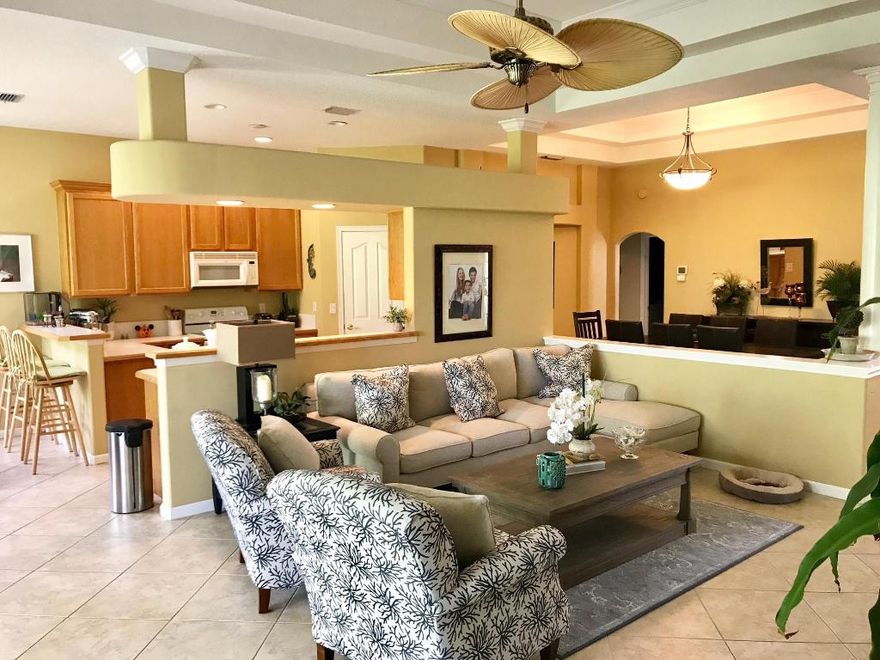 Immaculate Diana model featuring popular great room floor plan with possible third bedroom.  Just over 1,900 square feet with tile on the diagonal and private preserve view. This community offers low HOA fees that include lawn service, irrigation, alarm monitoring, guarded entry and use of the amenities that include two heated pools, clubhouse and golf is available on this championship 18-hole pay and play course with no membership required.  Close to shopping and just minutes to the beach.