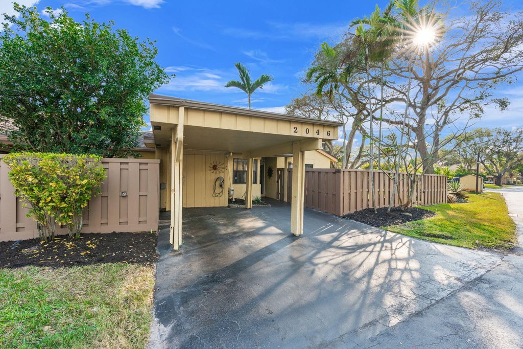 Photo of 2046 Deer Creek Woodlands Place, Deerfield Beach, FL 33442 (MLS # R11163818)