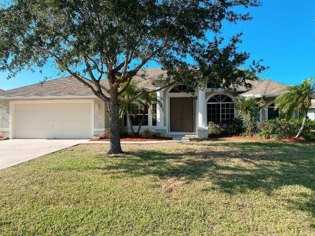 Photo of 1161 SE Cambridge Dr, Port Saint Lucie, FL 34952 (MLS # F10286102)