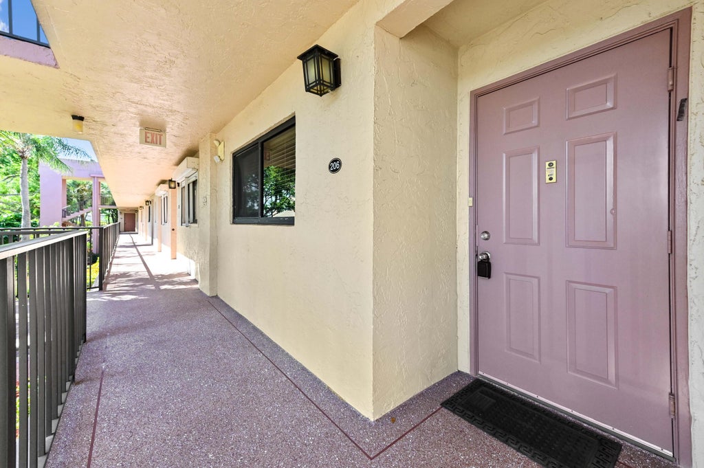 Photo of 15461 Pembridge Drive #206, Delray Beach, FL 33484 (MLS # R11074060)