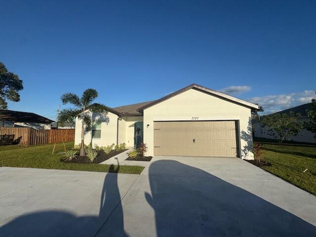 Photo of 3197 SW Savona Boulevard, Port Saint Lucie, FL 34953 (MLS # R11145273)