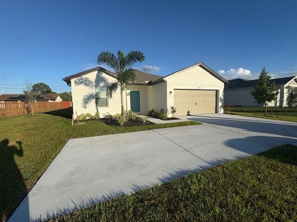 Photo of 3197 SW Savona Boulevard, Port Saint Lucie, FL 34953 (MLS # R11145273)