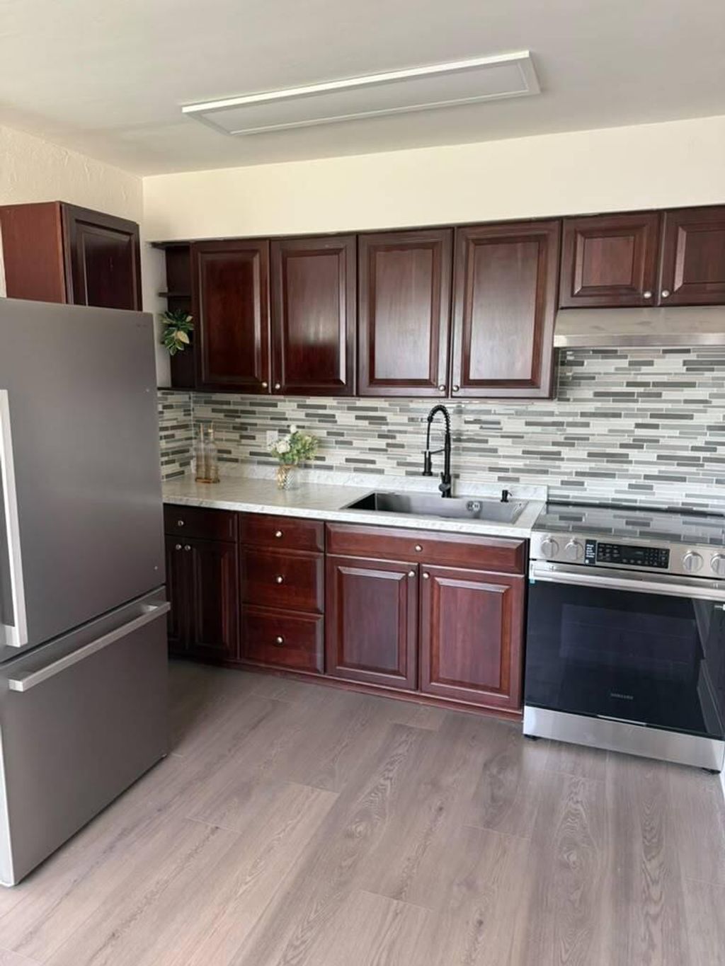 Photo of 720 Rickey Jackson Boulevard, Pahokee, FL 33476 (MLS # B26050826)