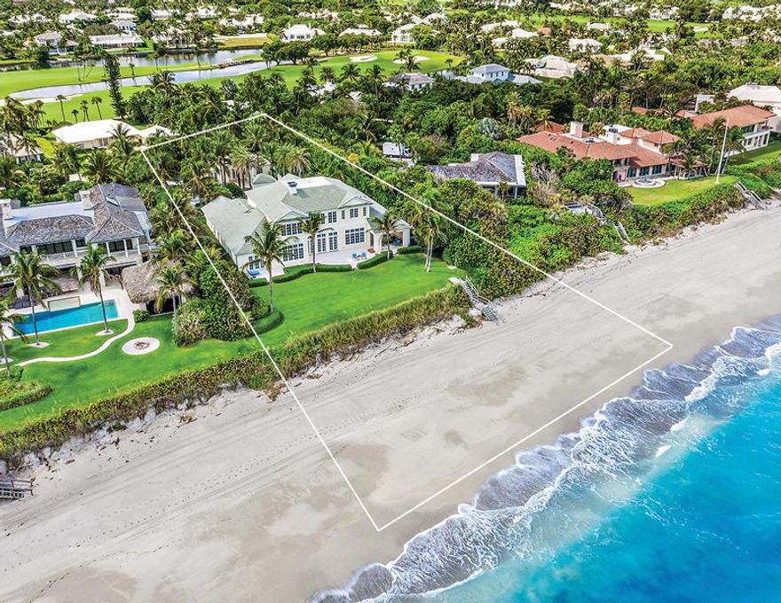 Located on Turtle Beach Road, this Estate offers a rare opportunity to purchase a move in ready home on the Atlantic Ocean. Featuring 8 Bed / 8.2 Bath, this 11,000 + SqFt home has 125' of Direct Oceanfront and close to an acre of land.  Exquisite detail, including intricate stonework, enhance this spectacular home and offer the perfect blend of classic elegance and charm. Some of the features include the sumptuous living room with panoramic views, soaring ceilings, marble floors, cypress beams, elevator, impact glass windows and doors.