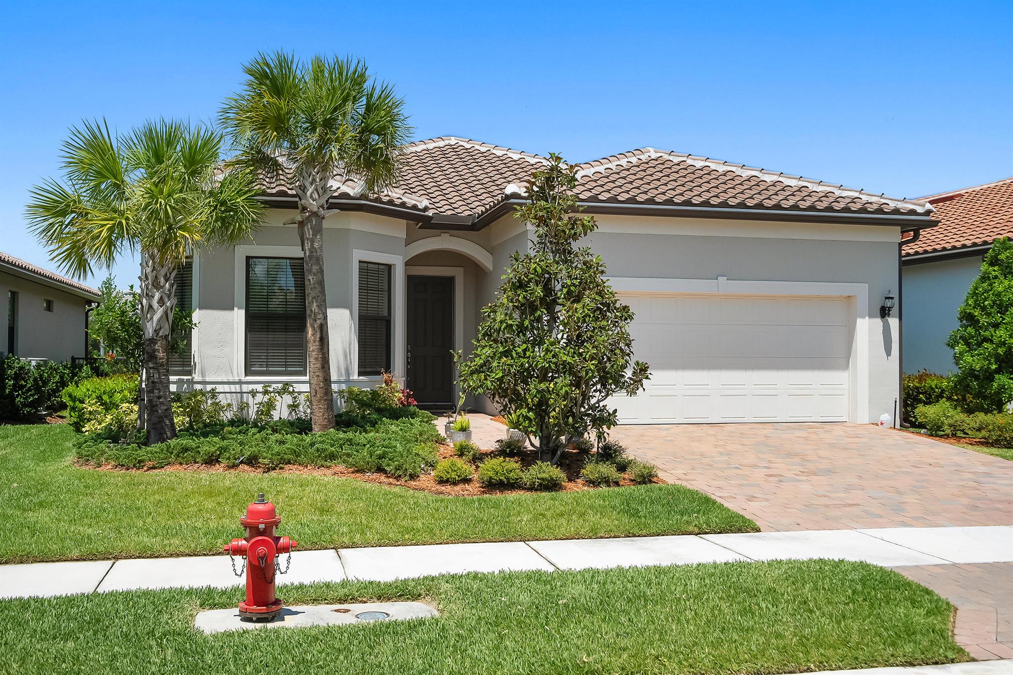 Immaculate 3BR + flex rm in sought-after Veranda Gardens! This 2BA home features whole-home water filteration system, impact windows/doors, wood-look tile thru-out, & an open layout w/ zero-corner pocket sliders to a large screened lanai. Kitchen boasts 42'' cabinets, quartz counters, & spacious island. Flex rm is perfect for office, gym, or guest space. Enjoy a fenced yard w/ partial preserve views & a 2CG. Resort-style amenities incl. clubhouse, 2 pools, spa, fitness ctr, tennis, b-ball, bocce, dog park, & playground. Move-in ready!