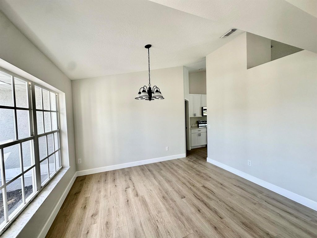 Photo of 6115 NW Ginger Lane, Port Saint Lucie, FL 34986 (MLS # R10963962)