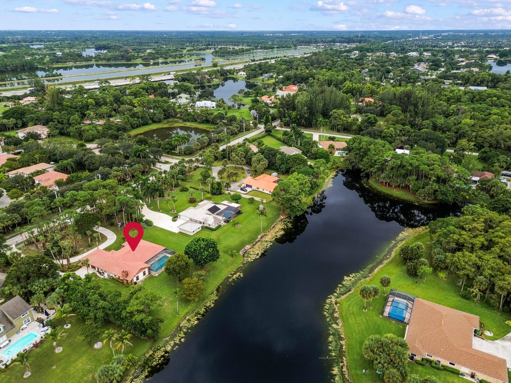 Photo of 627 Marginal Road, West Palm Beach, FL 33411 (MLS # B26082918)