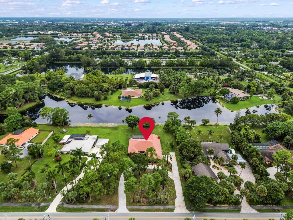 Photo of 627 Marginal Road, West Palm Beach, FL 33411 (MLS # B26082918)