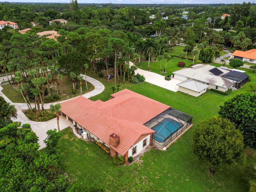 Photo of 627 Marginal Road, West Palm Beach, FL 33411 (MLS # B26082918)