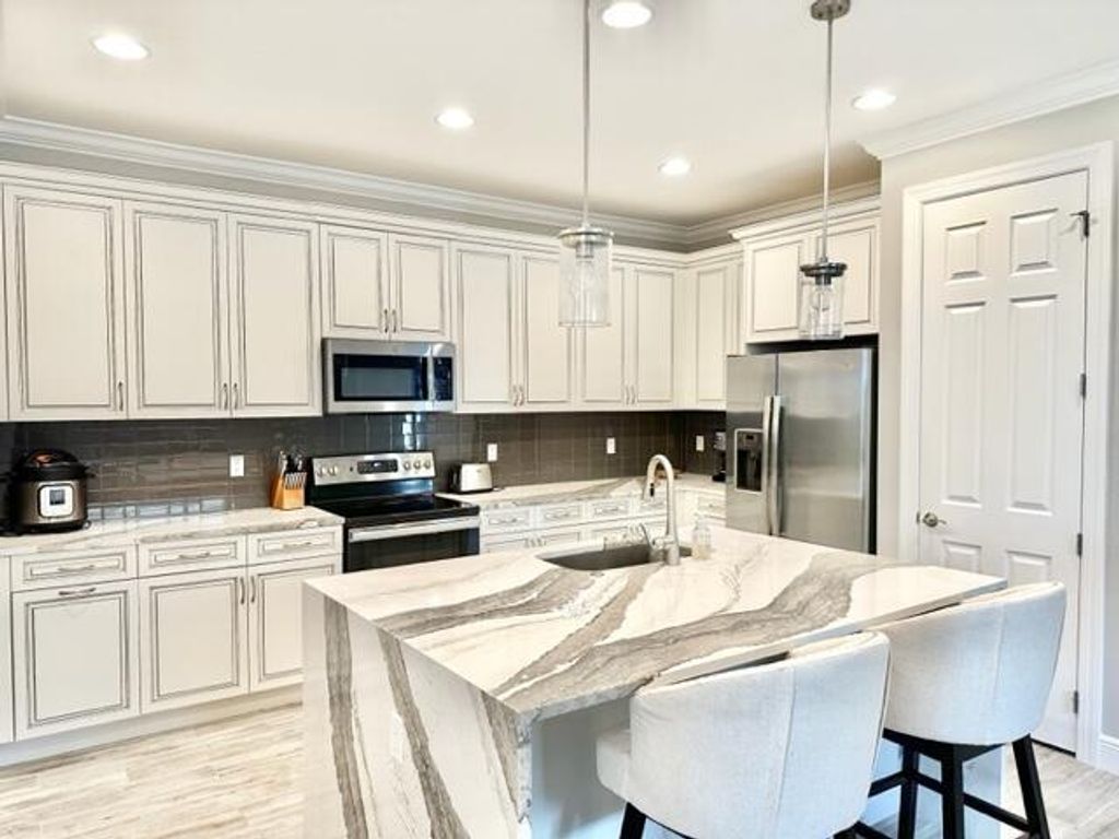 Photo of 24040 SW Firenze Way, Port Saint Lucie, FL 34986 (MLS # B26027874)