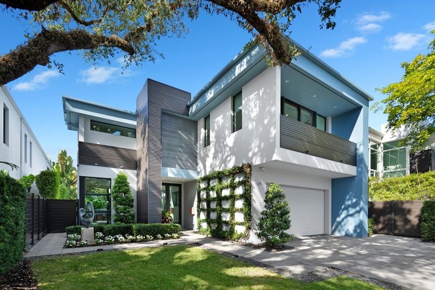 Located just steps from THE Victoria Park and the water, Las Olas, and beaches, this modern two-story home offers a seamless blend of style and convenience. Open layout with stunning views of the heated pool from multiple rooms, complemented by a standalone hot tub and a summer kitchen with an outdoor fridge. The home features a sleek kitchen with Miele appliances, a freshly painted interior (2021), a whole-house filtration system, and a tankless gas water heater. Additional updates include a mosquito system (2021), surge protection, new washer and dryer (2022), and updated pool equipment (2021). The two-car garage includes a lift, and the home sits in a highly elevated flood zone with natural TECO gas available. The seller is open to selling furnished, excluding personal art and items.