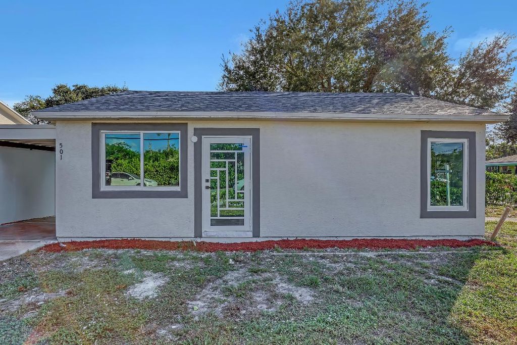 Photo of 802 S M Street, Lake Worth Beach, FL 33460 (MLS # R11020911)