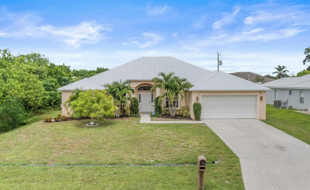 Photo of 873 SW Kappa Avenue, Port Saint Lucie, FL 34953 (MLS # R11121544)