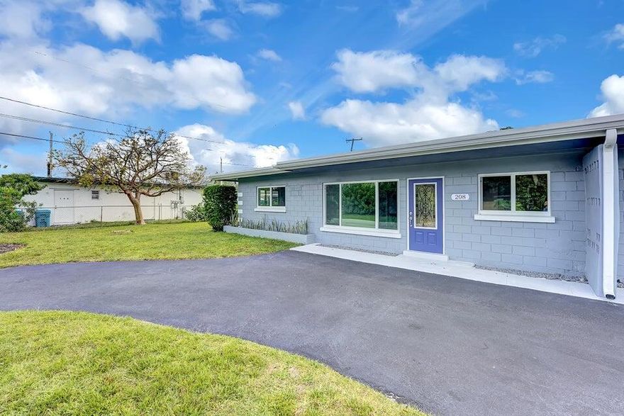 Beautiful and remodeled 3 Bed 2 Bath Unit in a Duplex with its own fenced in yard located only 1 mile from the Beach. Completely renovated kitchen and bathroom with all brand new appliances. Den converted into a third bedroom or office space with access to the fenced in back yard. There is plenty of parking space for this unit, including a covered car porch as well as a full front circular driveway. Fenced yard welcoming your pets. Washer and dryer in unit, Impact glass windows throughout. Perfect location right across from Boynton Beach City hall, next to amazing restaurants and shopping centers! This is the second unit, #208.