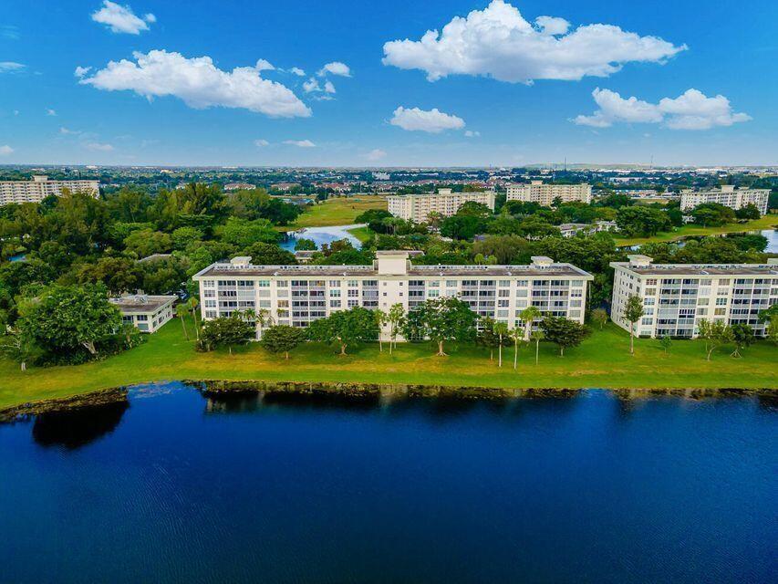 Spectacular Newly Renovated Beautiful 2 bedroom/2 bath Top Floor Penthouse unit with serene lake views. This unit features new flooring, paint, ceiling fans, tile, glass shower doors, white kitchen cabinets and granite countertops. Enjoy stunning views of the beautiful lake, providing a serene backdrop to your daily life. The monthly HOA fee includes water, garbage, cable, internet, pest control, and all the incredible amenities Palm Aire has to offer. A perfect full-time residence, vacation home, or investment. Optional golf membership. Great location near Topgolf, casino, shopping, dining, highways, and beaches. Walking distance to the casino, restaurants, supermarkets and major highways. Community Pool, BBQ area, Clubhouse, Tennis Courts & Fitness Center. Schedule a viewing today!
