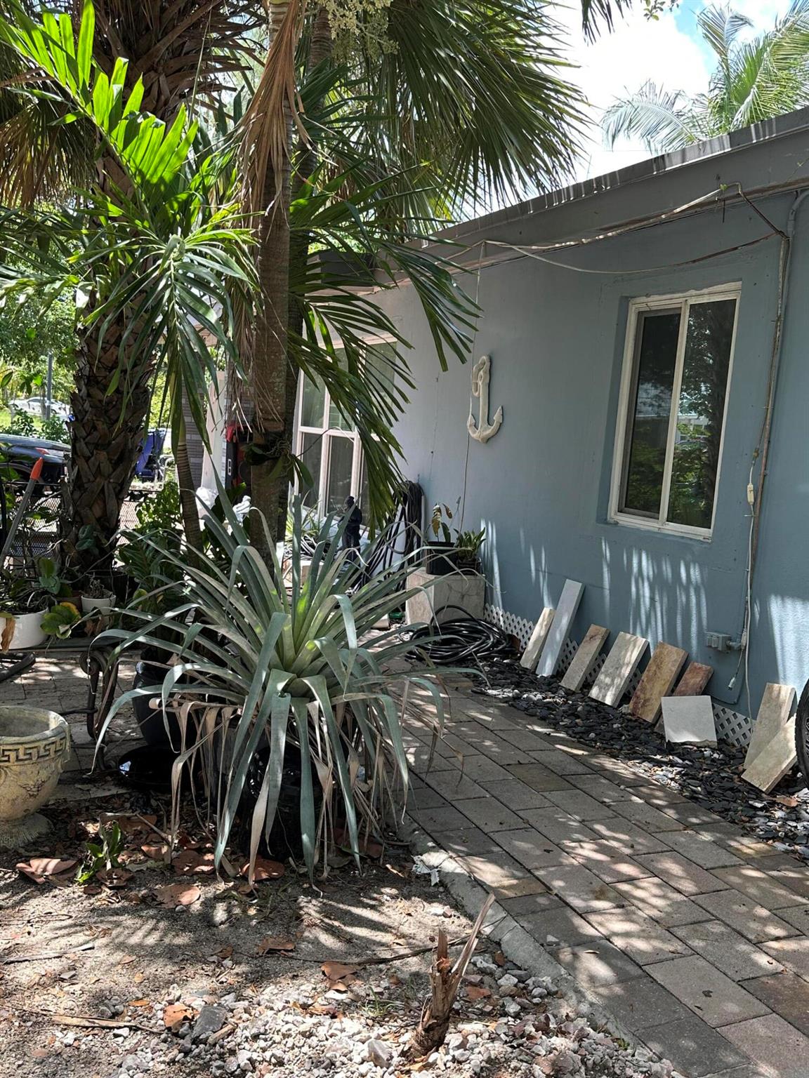 TROPICAL PARADISE. CORNER POOL HOME ON 12,040 SF LOT IN EAST POMPANO BEACH. 3 BEDROOM 1 BATH MAIN HOME, A STUDIO AND A ONE BEDROOM APT, EACH WITH SEPARATE ENTRANCE. FENCED BACK YARD WITH SHED, EXTRA LARGE POOL, ROOF 2006, NO HOA, NO RESTRICTIONS. HUGE POTENTIAL. LOCATION CLOSE TO FEDERAL HWY/ US1, RESTAURANTS, SHOPPING MALL, PARKS, MOVIES, I-95 AND FORT LAUDERDALE AIRPORT. MINUTES TO THE BEACH.