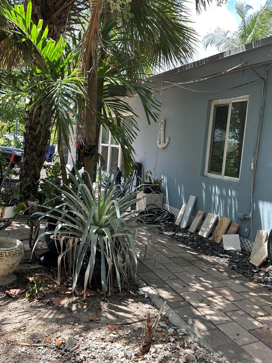 TROPICAL PARADISE.  CORNER POOL HOME ON 12,040 SF LOT IN EAST POMPANO BEACH. 3 BEDROOM 1 BATH MAIN HOME, A STUDIO AND A ONE BEDROOM APT, EACH WITH SEPARATE ENTRANCE. FENCED BACK YARD WITH SHED, EXTRA LARGE POOL, ROOF 2006, NO HOA, NO RESTRICTIONS. HUGE POTENTIAL. LOCATION CLOSE TO FEDERAL HWY/ US1, RESTAURANTS, SHOPPING MALL, PARKS, MOVIES, I-95 AND FORT LAUDERDALE AIRPORT. MINUTES TO THE BEACH.