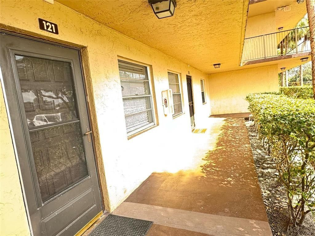 Photo of 3101 NW 47th Terrace #121, Lauderdale Lakes, FL 33319 (MLS # F10548195)