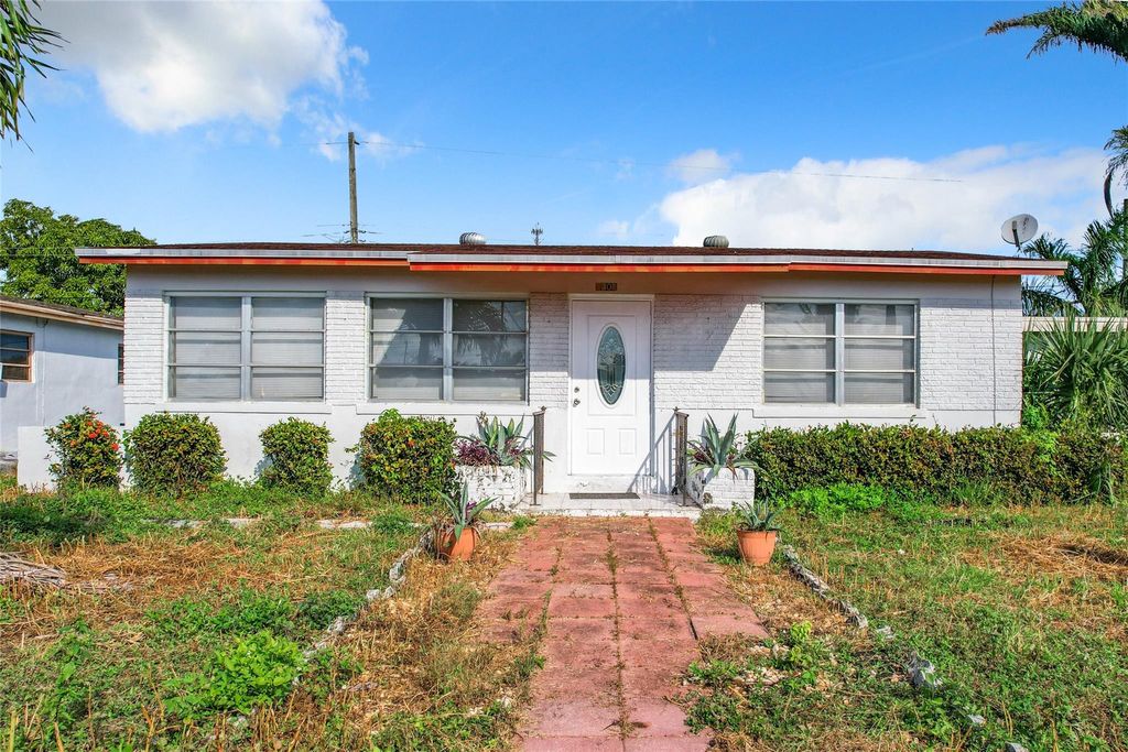 Photo of 1301 SW Avenue C Place, Belle Glade, FL 33430 (MLS # F10411846)