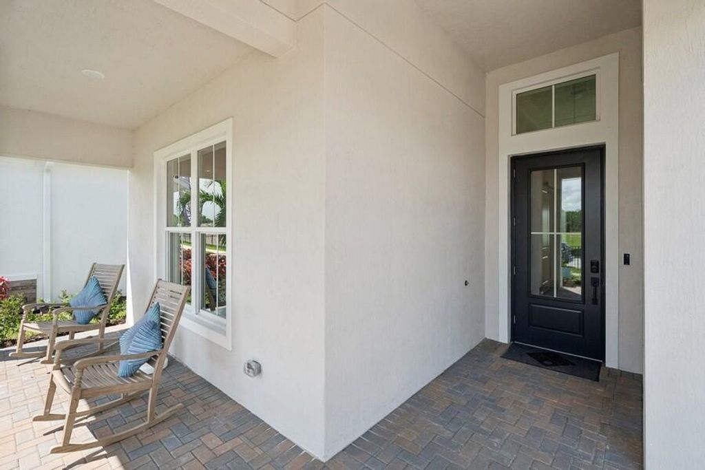 Photo of 10224 NW Field Flower Trail, Port Saint Lucie, FL 34987 (MLS # B26019254)