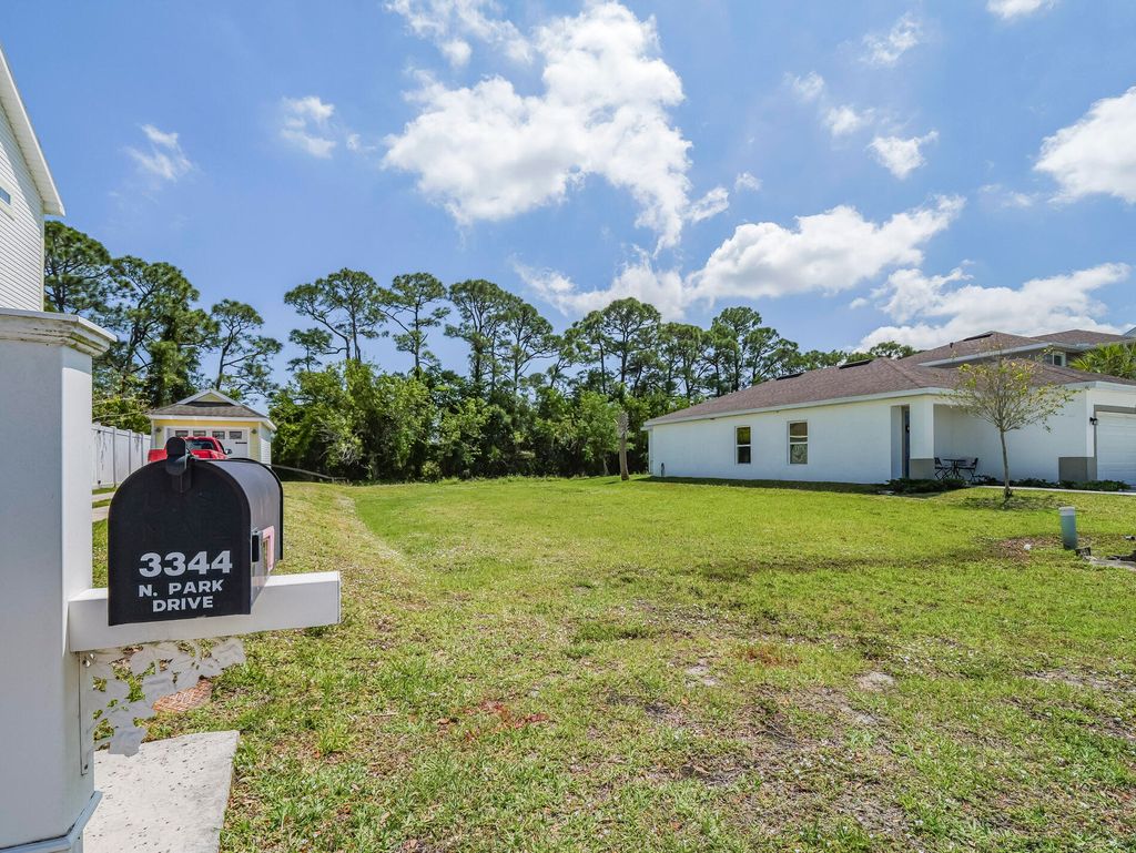 Photo of 3344 N Park Drive, Fort Pierce, FL 34982 (MLS # R11077477)