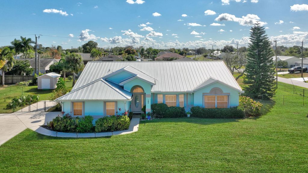 Photo of 184 SW Uneeda Place, Port Saint Lucie, FL 34953 (MLS # R11154132)