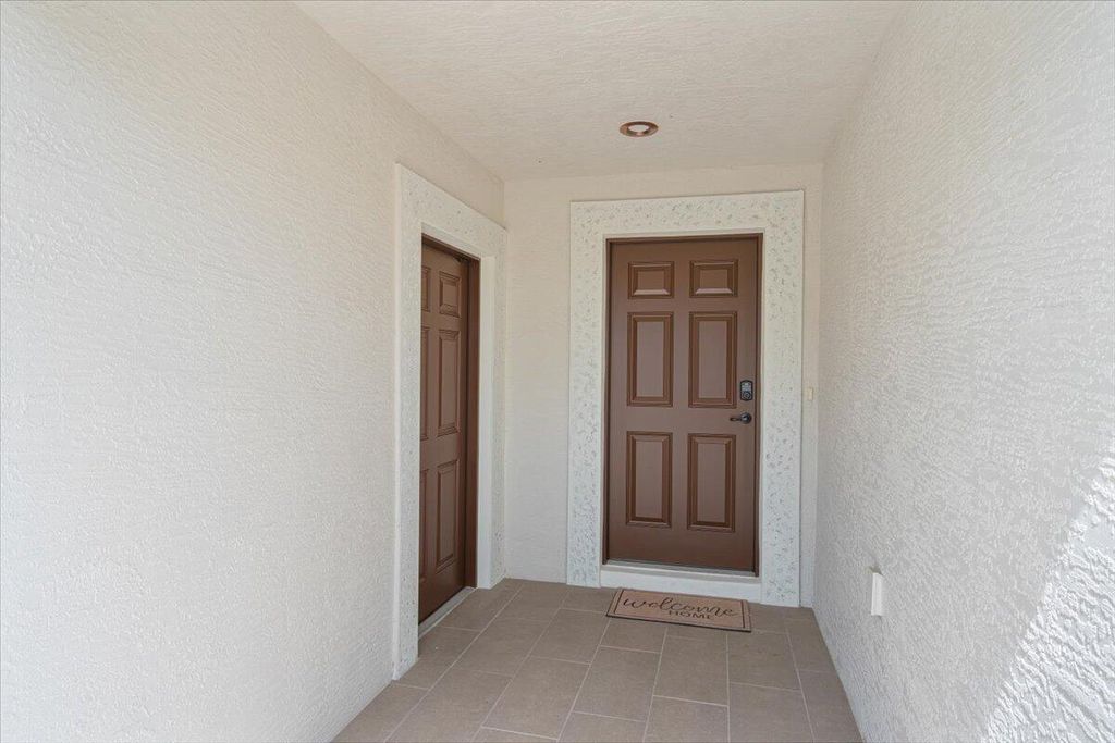 Photo of 15 Florida Way, Port Saint Lucie, FL 34952 (MLS # R11090462)