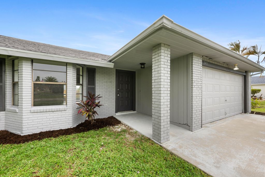 Photo of 2431 SE Shell Avenue, Port Saint Lucie, FL 34952 (MLS # R11050881)