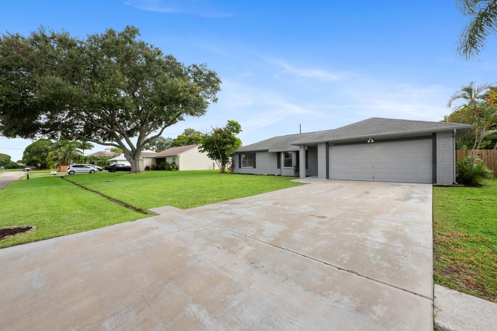 Photo of 2431 SE Shell Avenue, Port Saint Lucie, FL 34952 (MLS # R11050881)