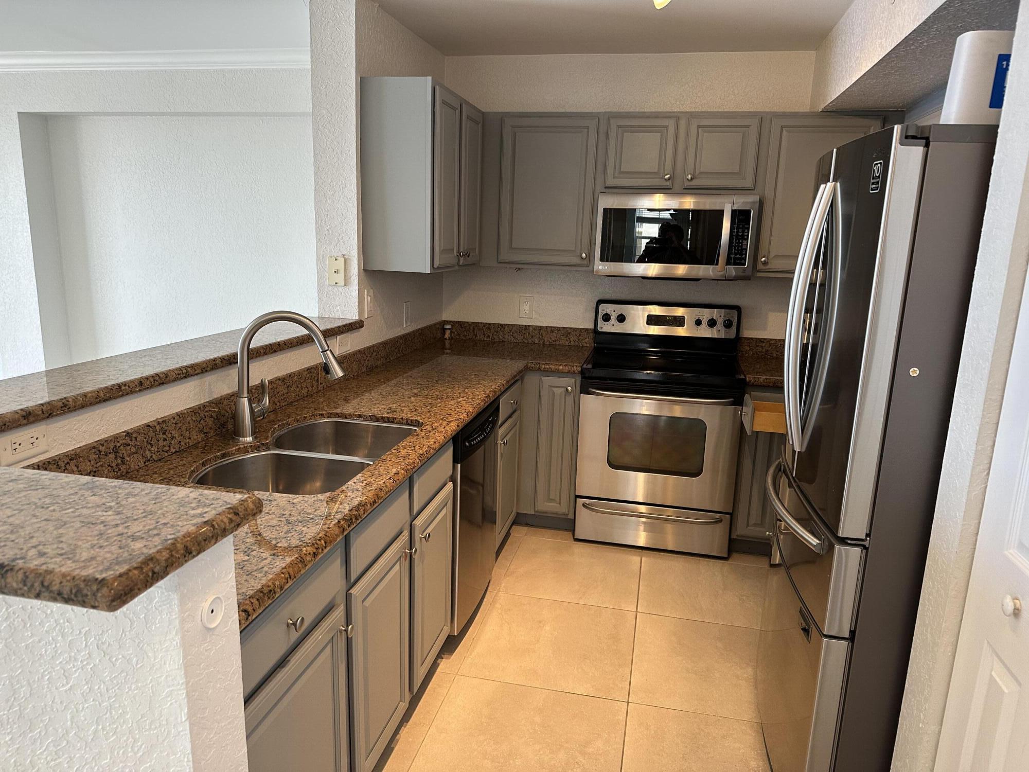 Premium Flagler Pointe condo with over-sized private balcony. The large, 1334 sq ft. 2 bed/ 2 bath condo offers a spacious, free-flowing open floor plan for comfortable luxury living and entertaining guests. Your waterview can be seen from every room and bedroom in the home. Condo has too many upgrades to list but a few include 24'' tile floors, stainless appliances, remodeled bathrooms, custom closets, Brand New Impact windows & Doors, upgraded lighting. Washer/dryer in laundry room and 2 parking spaces included. Live the resort lifestyle at Flagler Pointe with countless amenities including swimming pool, hot tub, outdoor kitchen & grill, on-site dog park, gym, sauna, clubroom, billiards, business center, on-site management, 24hr security and more! Premier location