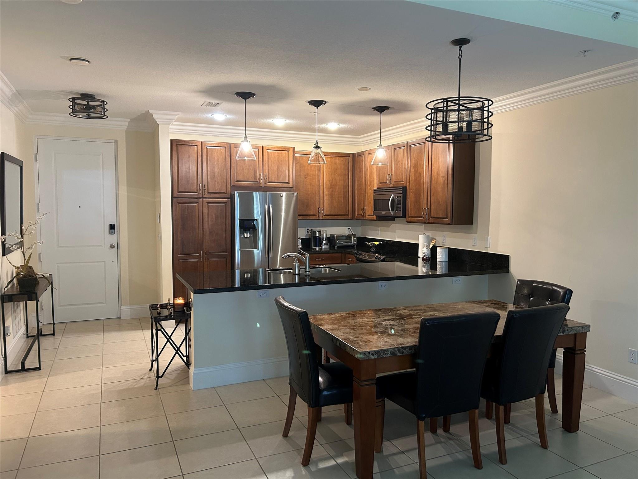 Spacious FURNISHED short term rental with flexible terms! Three bedrooms / two bathrooms located in highly desirable neighborhood of The Residences at Latitude Delay Beach! Owner prefers a 7 month term starting November 1st, 2025 but can be flexible. Home is entirely furnished. One pet allowed with approval. Move in funds to be discussed dependent on lease term. HOA approval required. Condo is on the second floor and in secured building with access via call box. Only one assigned parking spot comes with the unit; ample guest parking.