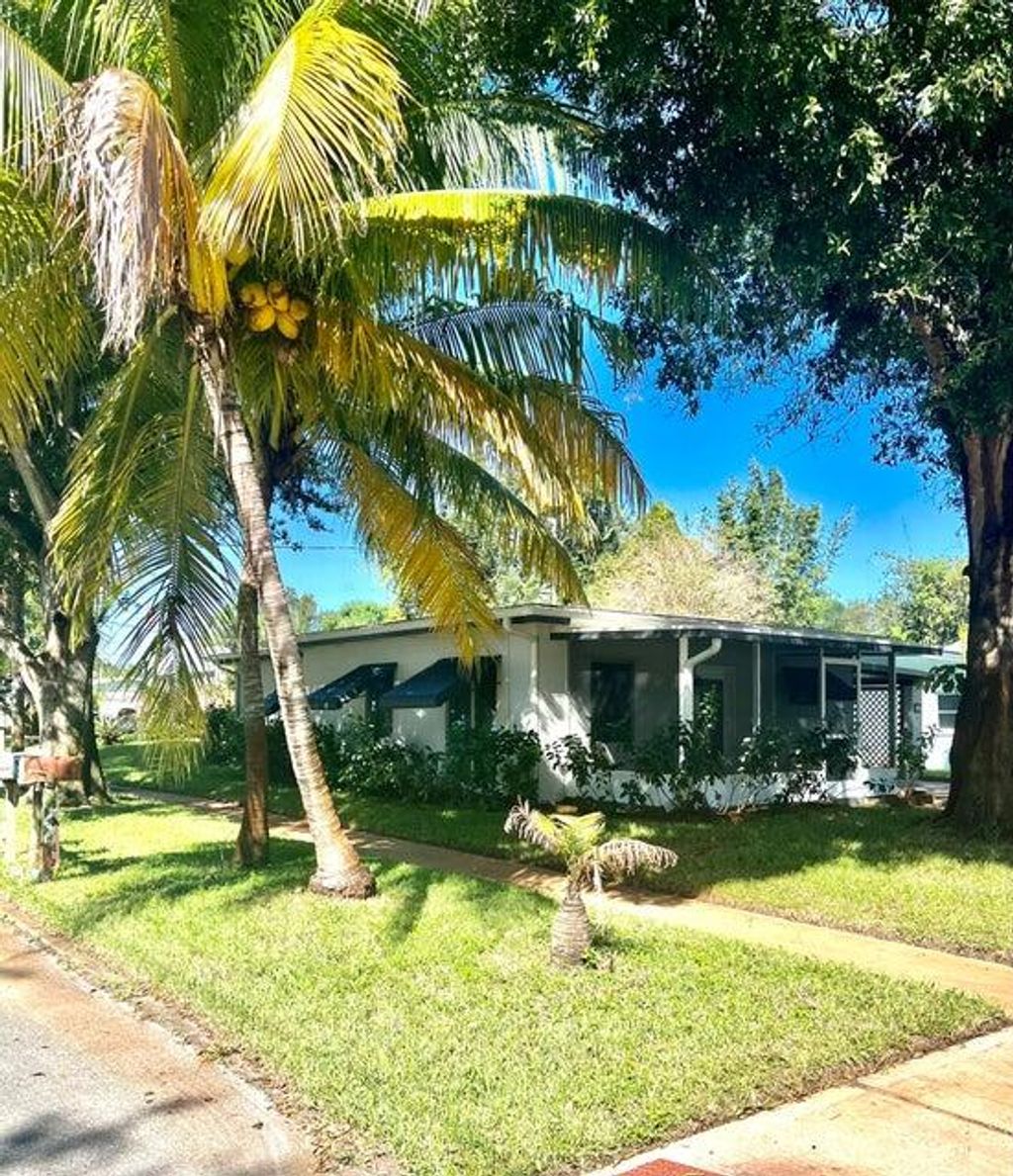 Photo of 882 NE Rio Avenue, Jensen Beach, FL 34957 (MLS # R10981253)