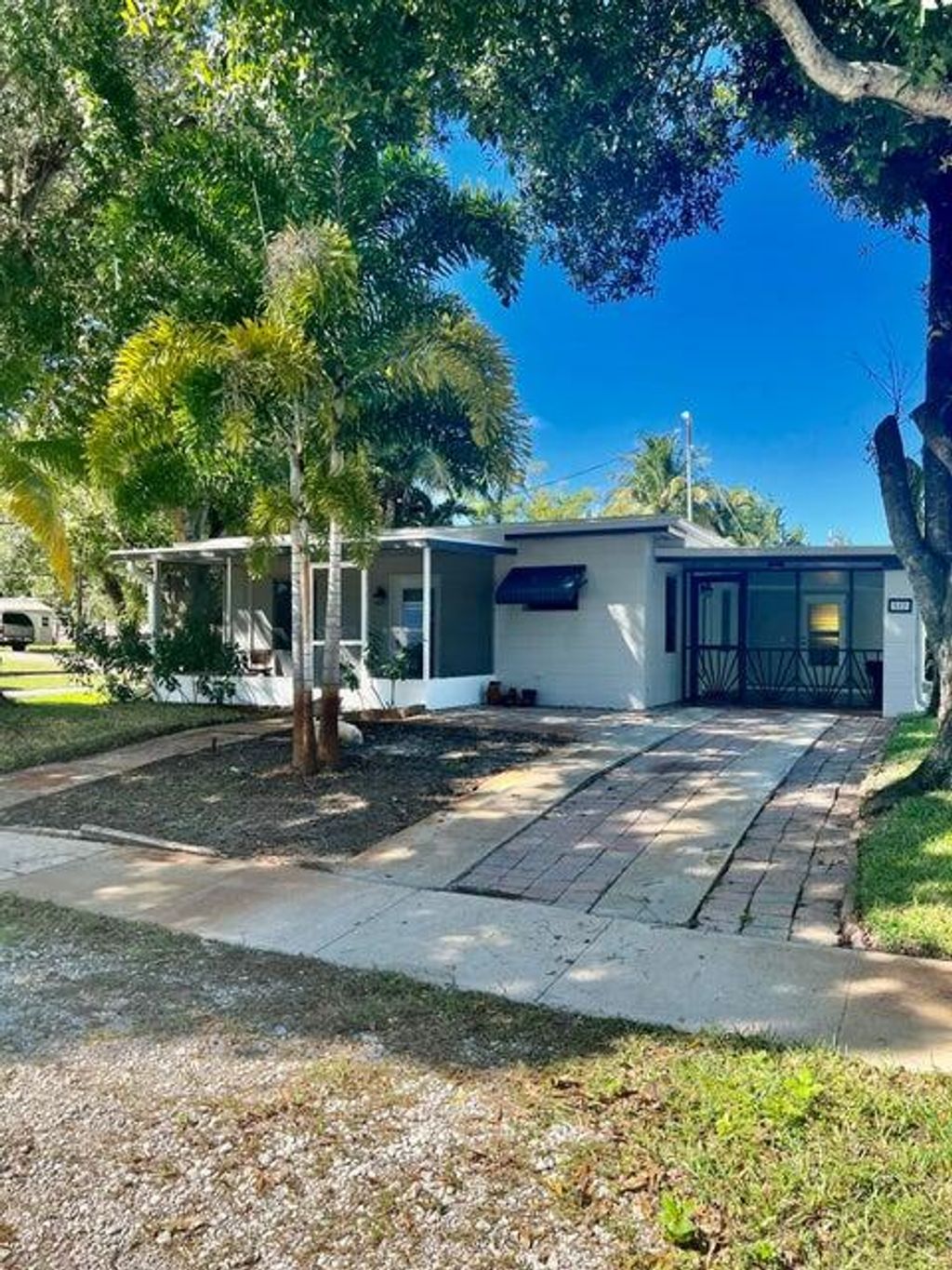 Photo of 882 NE Rio Avenue, Jensen Beach, FL 34957 (MLS # R10981253)