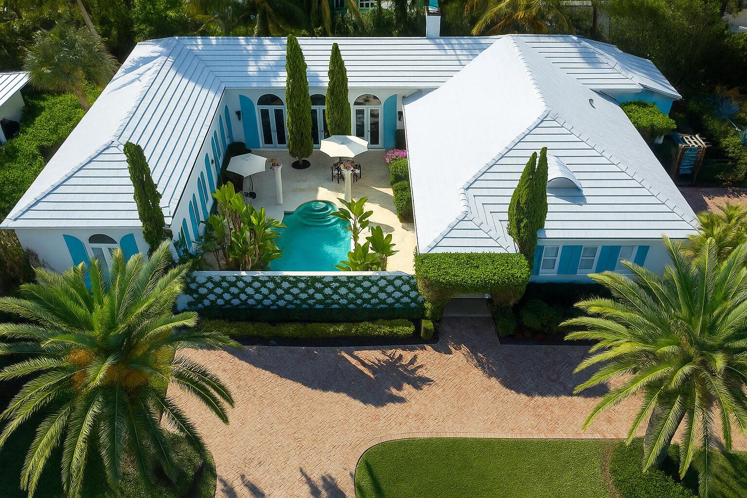 Palm Beach Perfection! Exquisitely appointed with new luxury furnishings. Three bedrooms with updated ensuite baths. Soaring ceilings. Newly refreshed kitchen with new induction cooktop, ovens and refrigerator. Private courtyard entrance and pool. Just minutes from Worth Avenue, Mar a Lago and The Bath and Tennis club. Ibis Island is just South of the Estate section. Beach access, Par 3 Golf, Phipps Ocean Park and tennis just across the street.